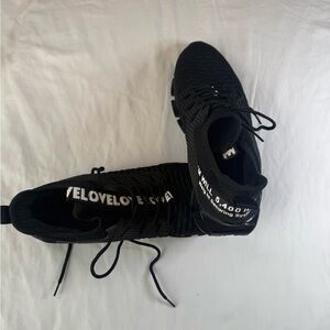 Black Athletic Knit Sneakers with White Text